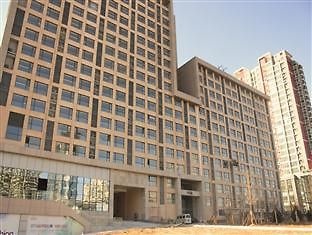 Sweetome Vacation Rentals Pollex Plaza Qingdao Esterno foto